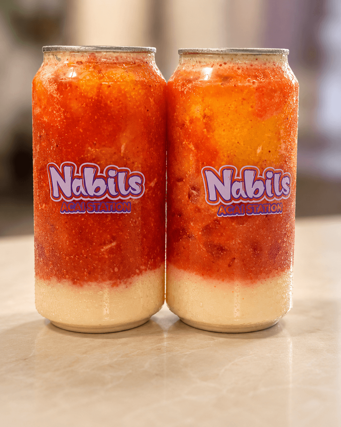 Two sparkling probiotic splash drinks with citrus and ice